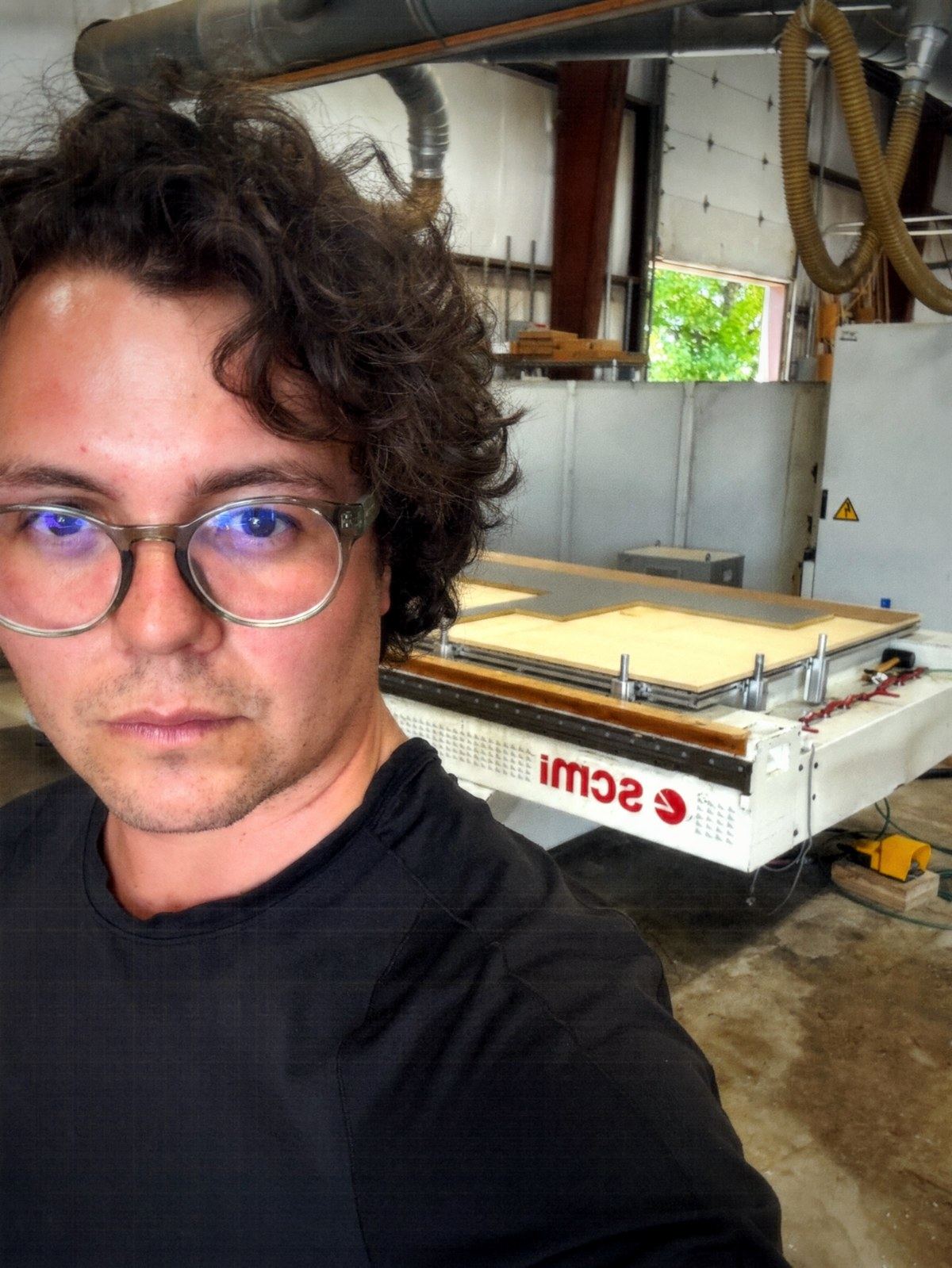 Dorian Dégagé at the vacuum press forming the birch Lotus formwork in the studio, San Antonio